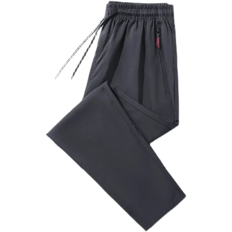 Men’s slim fit casual joggers by Athletic Sanctuary featuring straight leg cut and elastic waistband, displayed on a neutral background.