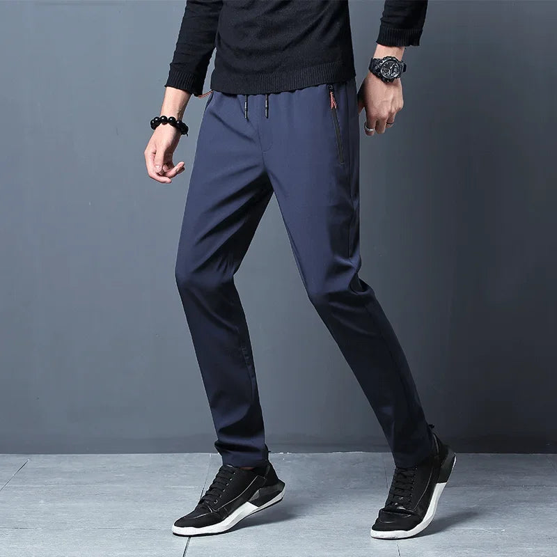 Men’s slim fit casual joggers by Athletic Sanctuary, straight leg pants with elastic waistband, suitable for everyday comfort and style.