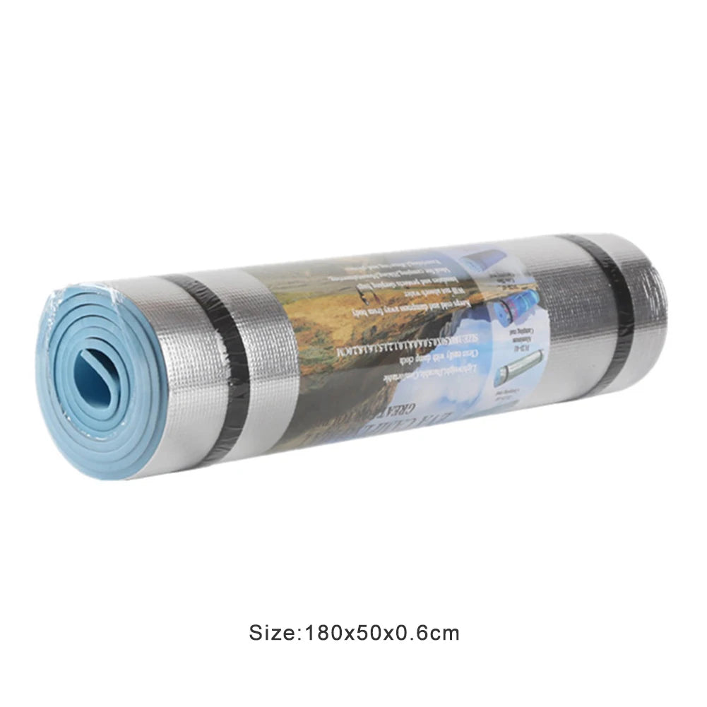 Athletic Sanctuary EVA exercise mat in blue, 1800x500x6mm, moisture-proof yoga and camping mat laid flat on a wooden floor.