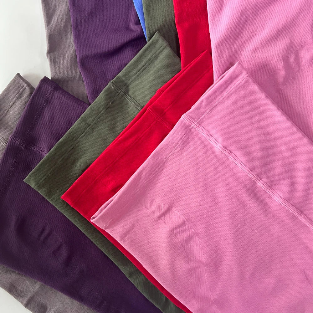 Athletic Sanctuary flared yoga leggings with high-waist design, sculpting fit, and comfortable stretch perfect for active movement.