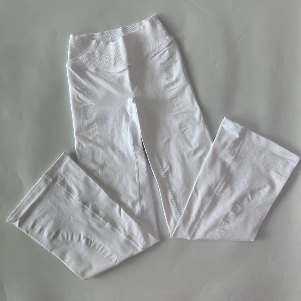 Athletic Sanctuary flared yoga leggings featuring high-waist design and sculpting fit, ideal for comfortable movement and flexibility.