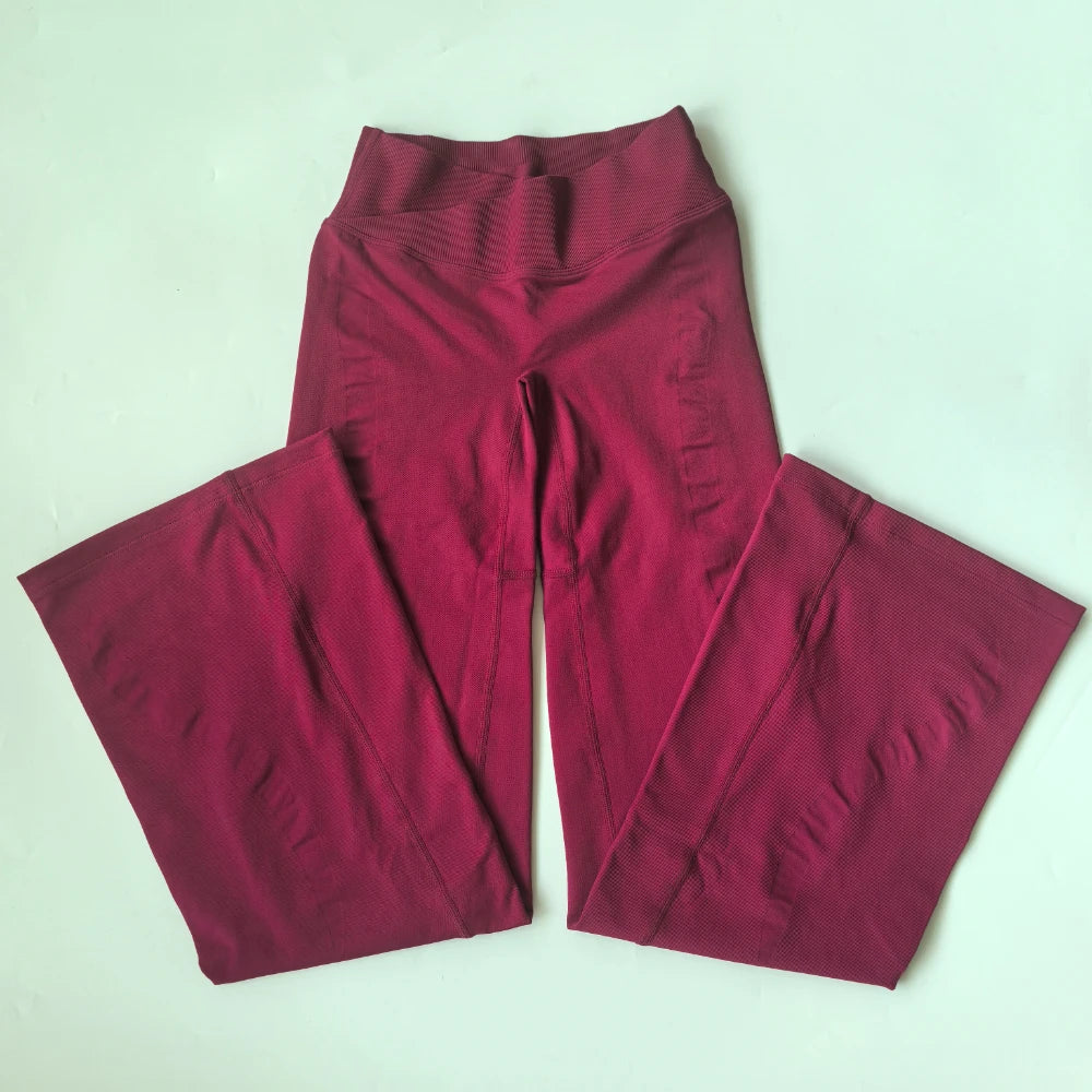 High-waist sculpting flared yoga leggings by Athletic Sanctuary, showcasing comfortable stretch fabric and flared design for movement.