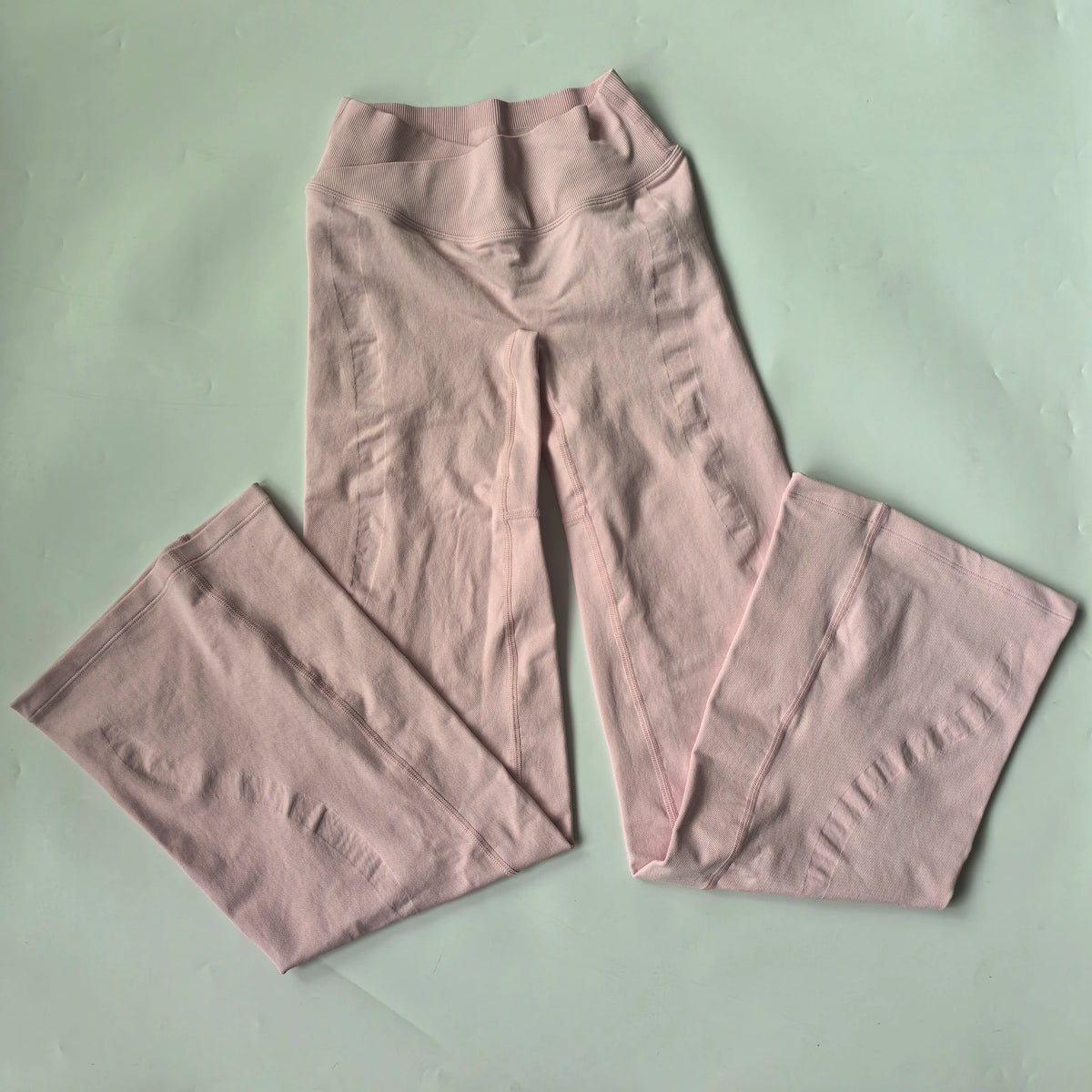 Athletic Sanctuary flared yoga leggings with high-waist, sculpting fit and comfortable stretch for active movement.