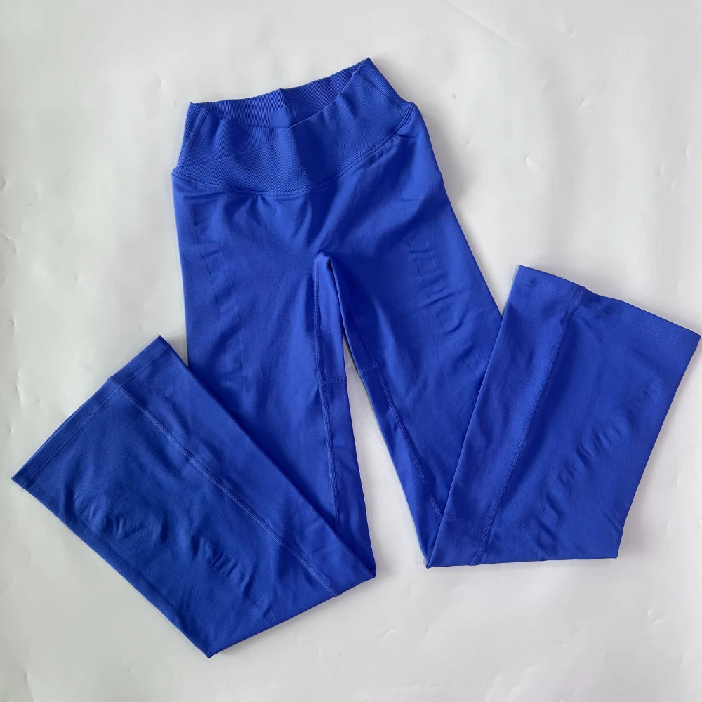 Athletic Sanctuary flared yoga leggings with high-waist design, sculpting fit, and comfortable stretch for active movement.
