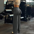 Women’s wide leg yoga pants by Athletic Sanctuary, high waist tummy control leggings in black, featuring a comfortable, relaxed fit.