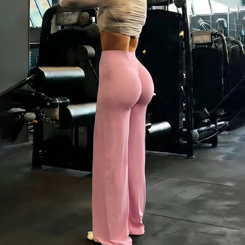 Women’s wide leg yoga pants by Athletic Sanctuary featuring high waist design and tummy control, perfect for active wear.
