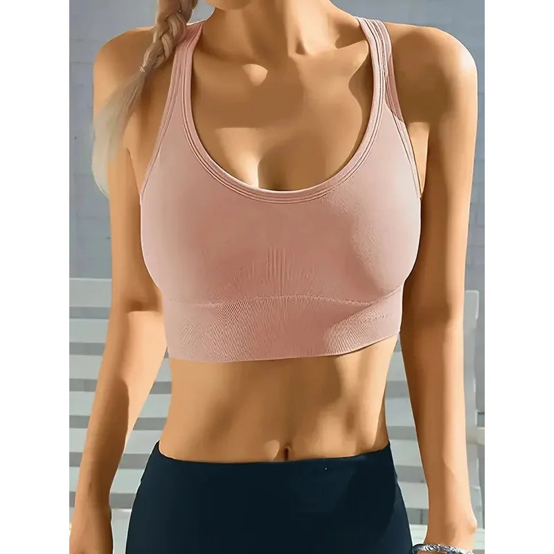 Pink women's ribbed seamless crop tank from Athletic Sanctuary, designed for comfort and style during workouts.
