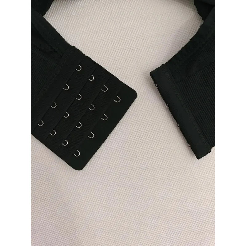 Black seamless crop tank top for women by Athletic Sanctuary, featuring a ribbed texture and a strapless design.