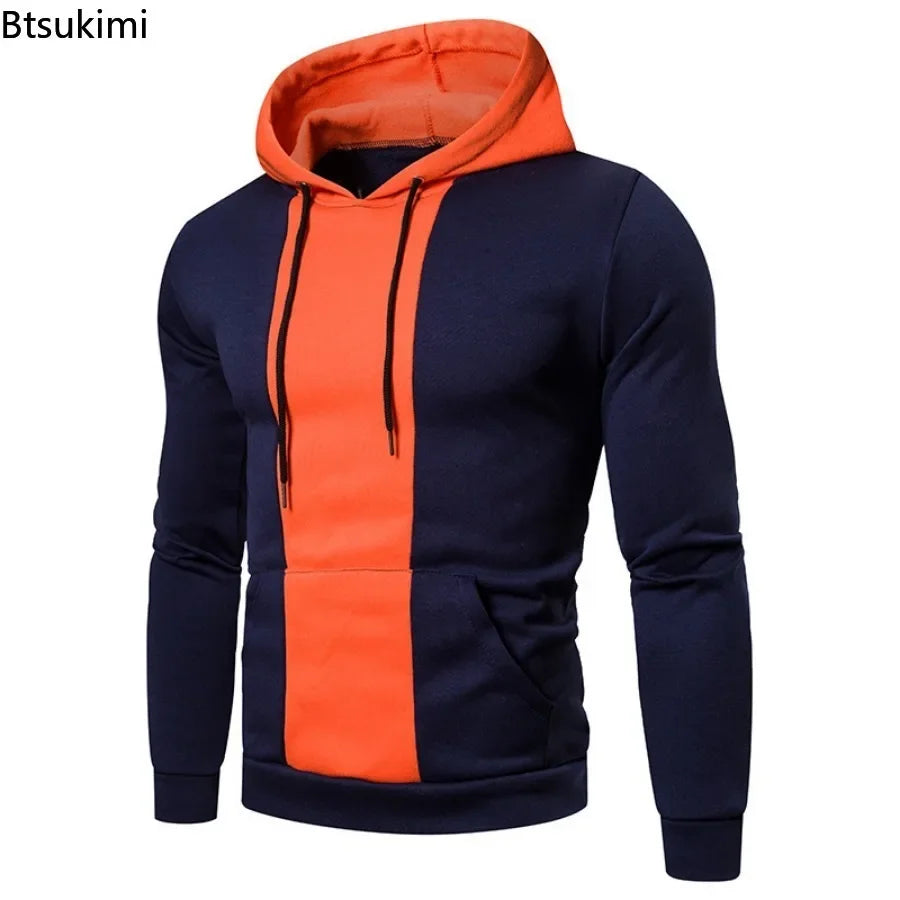 Men's fleece hoodie by Athletic Sanctuary featuring patchwork design, large pocket, color block pattern, casual hooded sweatshirt.