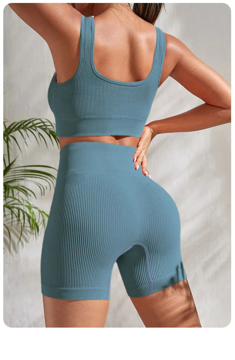 Women's ribbed seamless gym set by Athletic Sanctuary, crop tank and high-waist shorts, in a comfortable, stylish workout outfit.