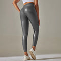 Women’s high waist yoga leggings by Athletic Sanctuary, featuring stretchy fabric and a sleek fit for running and fitness activities.