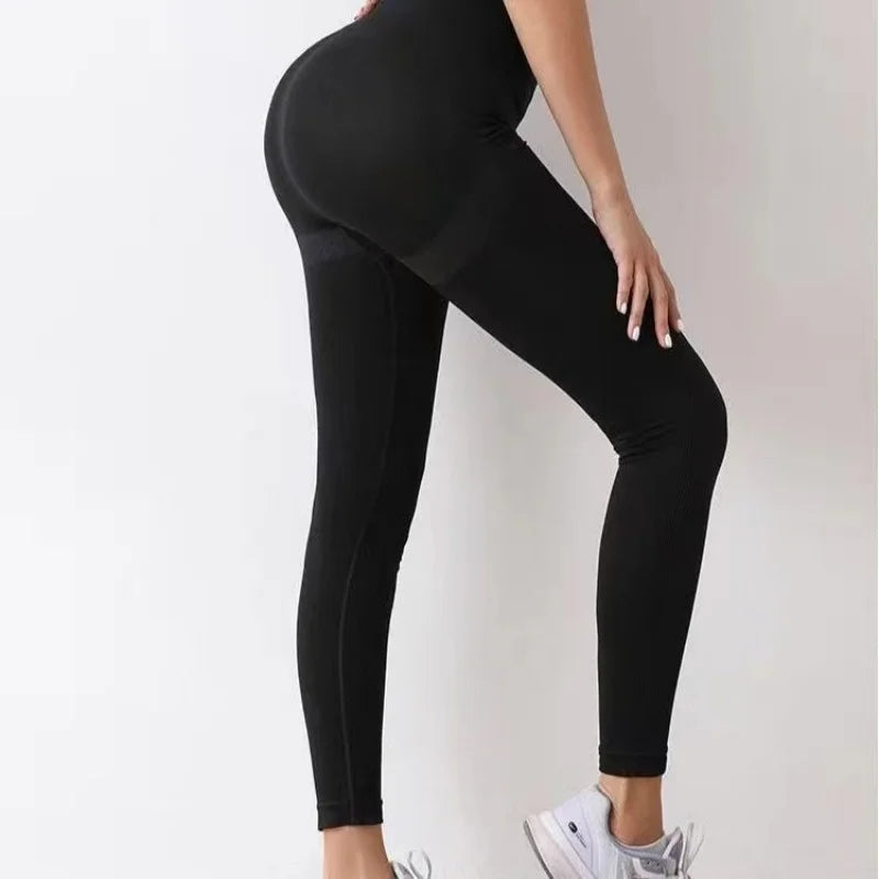 Black women’s seamless push-up high waist gym leggings by Athletic Sanctuary, showing a close-up of the fitted, stretchy fabric.