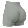 Women's seamless summer shorts by Athletic Sanctuary, high-stretch gym and yoga shorts, black color, close-up view of fabric and fit.