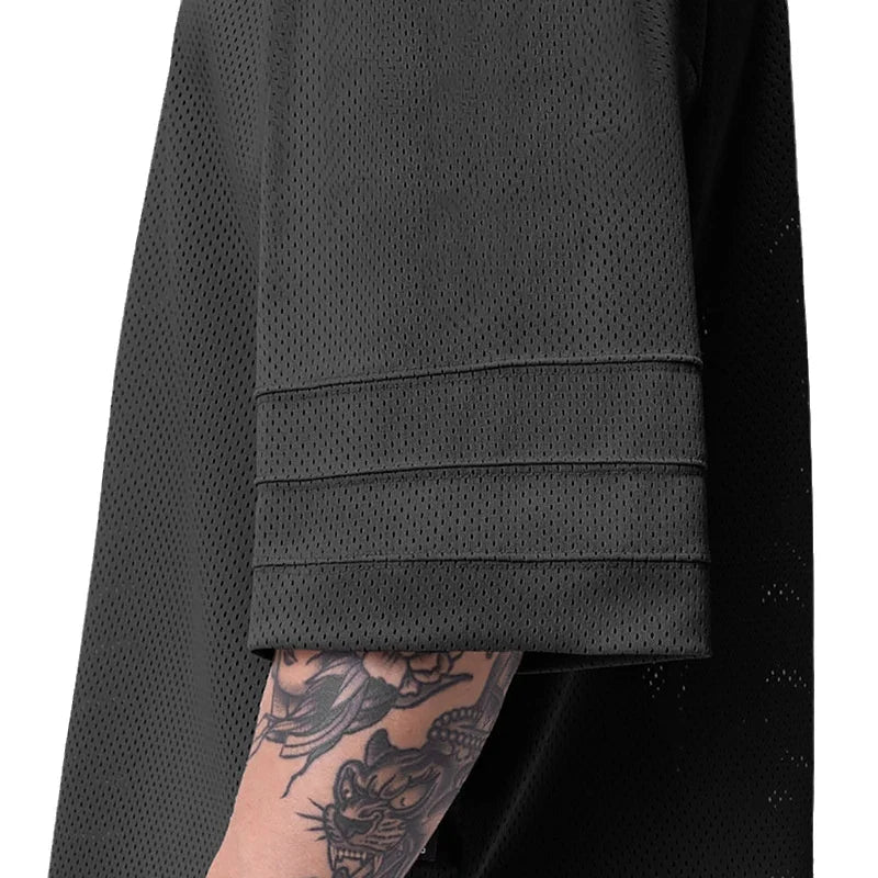 Men’s oversized Athletic Sanctuary performance T-shirt, quick-dry gym essential, shown in lightweight fabric with a relaxed fit.