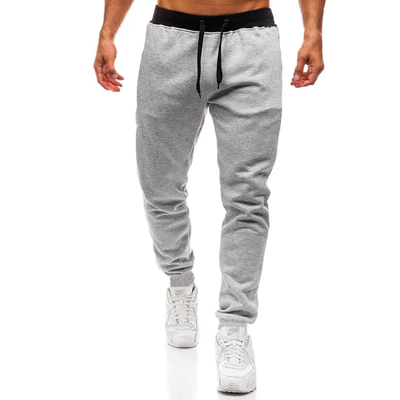 Men’s fleece-lined athletic joggers from Athletic Sanctuary, loose fit sweatpants with a comfortable elastic waistband and side pockets.