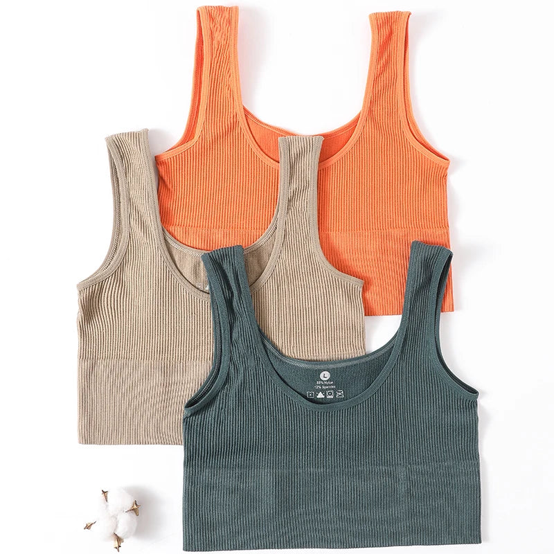 Women's seamless ribbed wireless sports camisole crop top by Athletic Sanctuary, showing the fitted, ribbed fabric and scoop neckline.