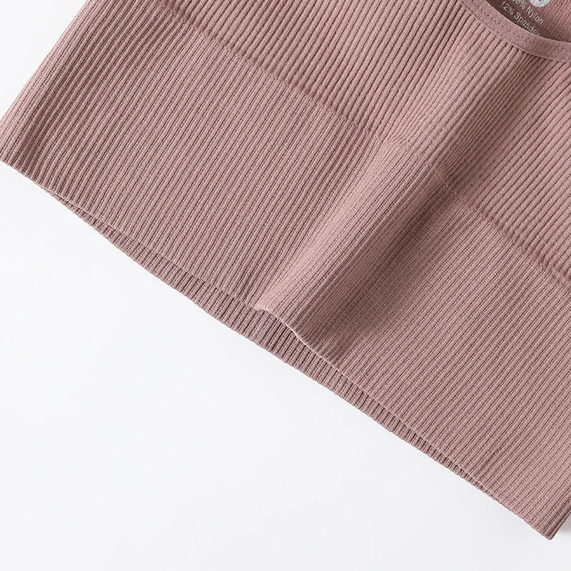 Women's seamless ribbed wireless sports bra crop top by Athletic Sanctuary, shown in a close-up view highlighting fabric texture and fit.