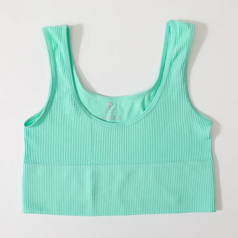 Women’s seamless ribbed wireless sports bra crop top by Athletic Sanctuary, showing its fitted ribbed fabric and supportive design.