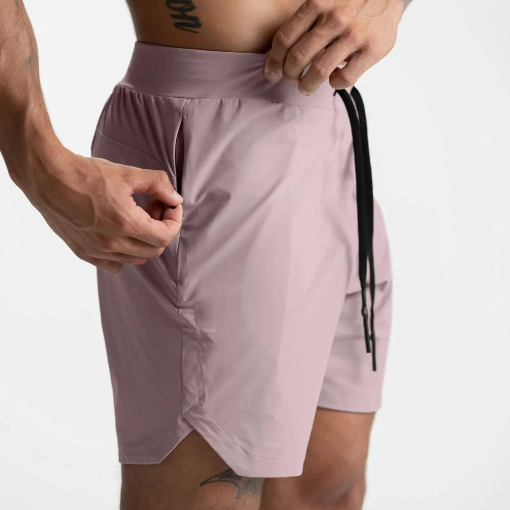 Men’s quick-dry performance shorts by Athletic Sanctuary, designed for training and everyday wear, shown in black with a relaxed fit.