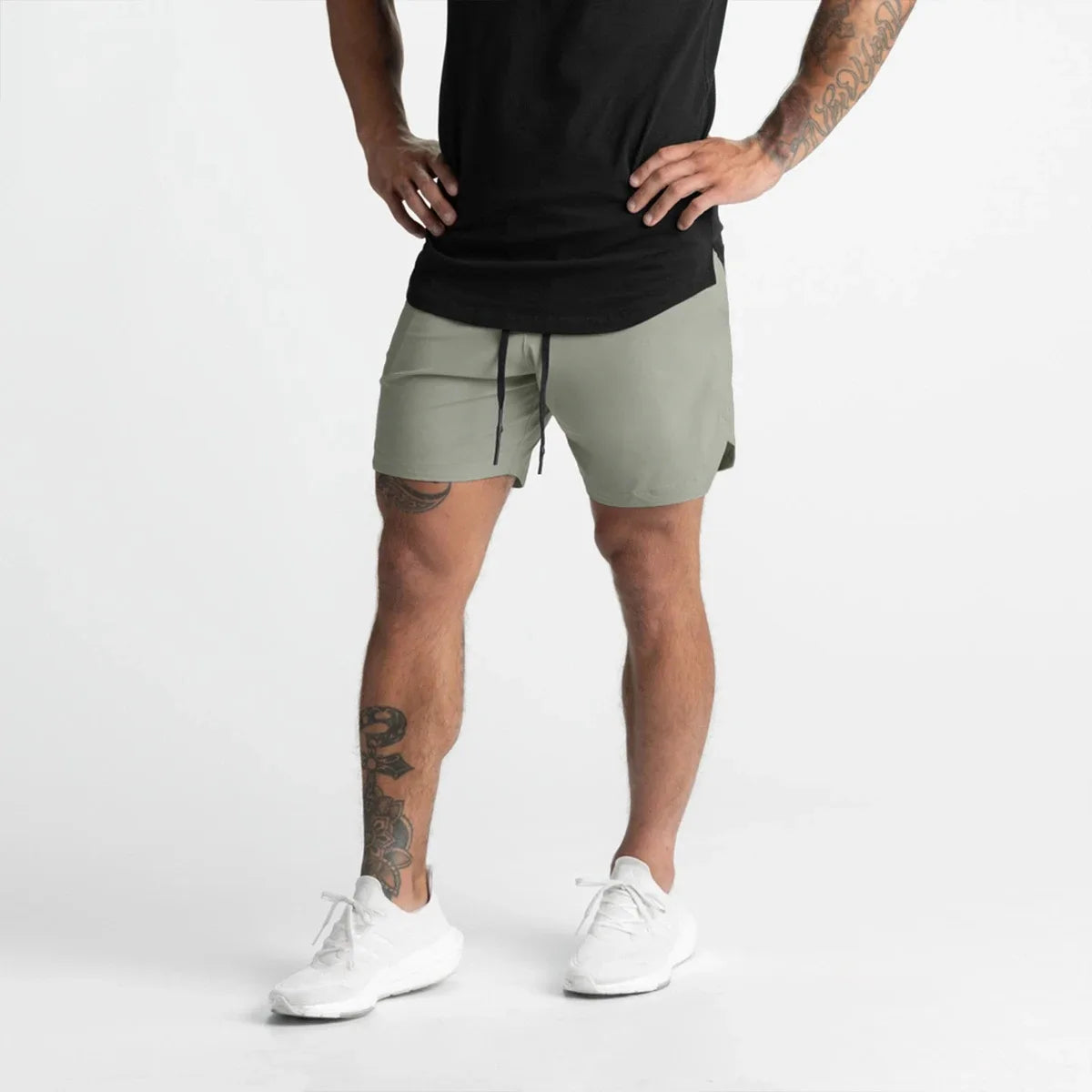 Men’s Athletic Sanctuary quick-dry performance shorts for training and everyday wear, shown in black with lightweight fabric and elastic waistband.