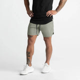 Men’s Athletic Sanctuary quick-dry performance shorts for training and everyday wear, shown in black with lightweight fabric and elastic waistband.