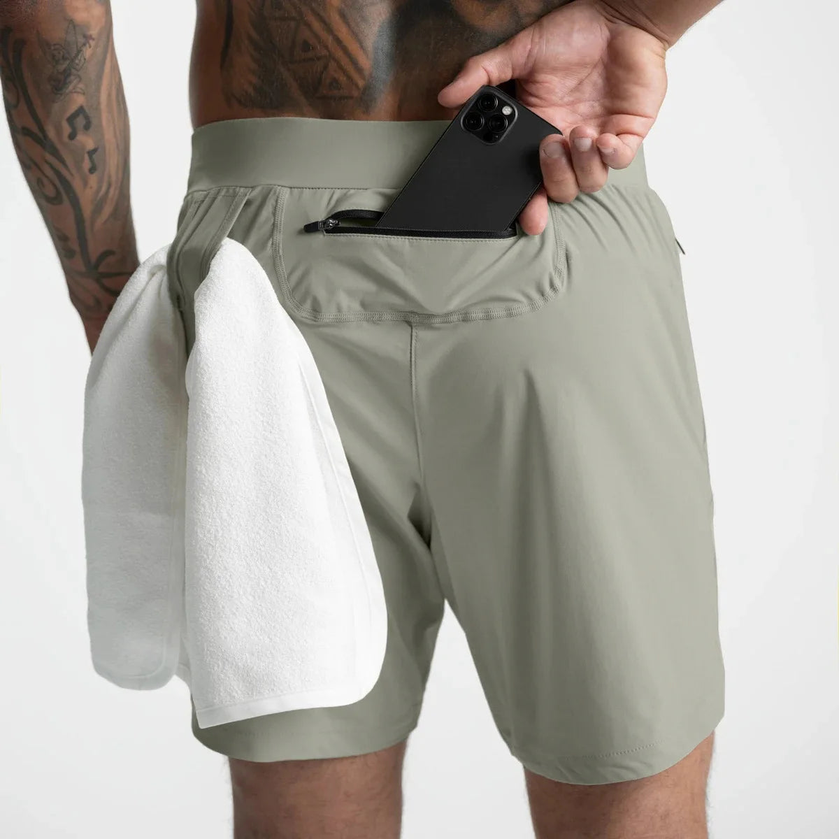 Men’s athletic quick-dry performance shorts in black with a relaxed fit, designed for training and everyday wear by Athletic Sanctuary.