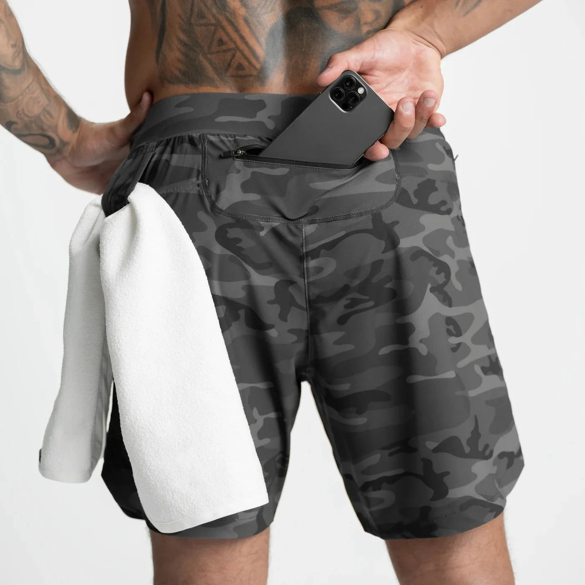 Men’s quick-dry performance shorts by Athletic Sanctuary, designed for training and everyday wear, shown in a relaxed fit.