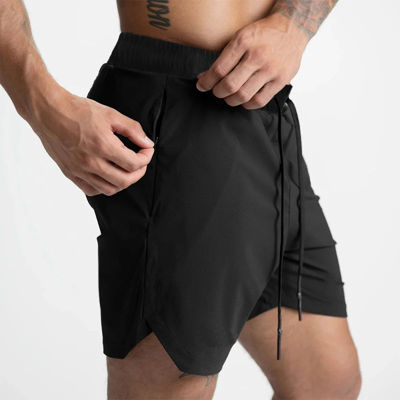 Men’s quick-dry performance training shorts by Athletic Sanctuary, shown in black with elastic waistband and side pockets.