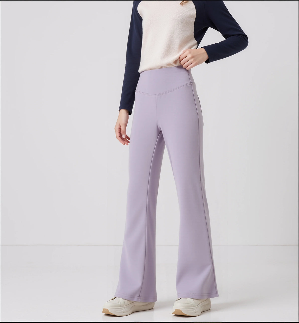 Girls’ high-waist flared leggings by Athletic Sanctuary, showing stretch fabric and flared leg design for everyday comfort.