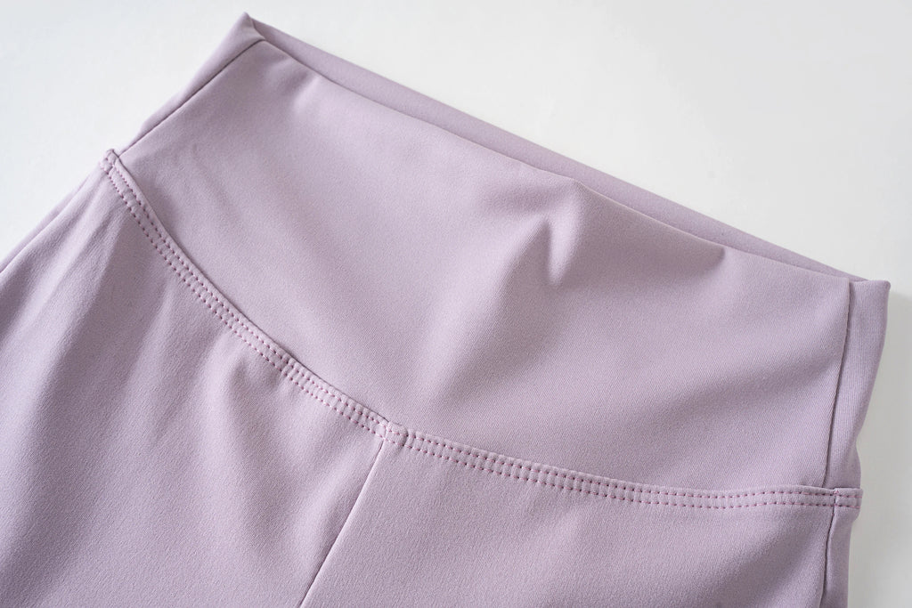 Girls' high-waist flared leggings by Athletic Sanctuary featuring stretch fabric for comfortable everyday movement.