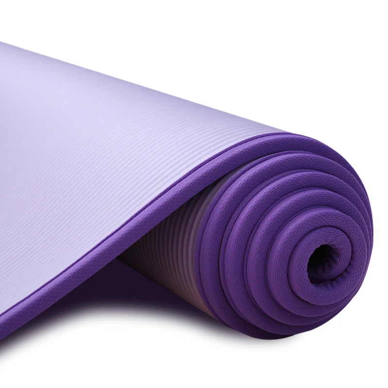 Extra thick 10mm Athletic Sanctuary yoga mat with non-slip surface, ideal for Pilates and workout routines.