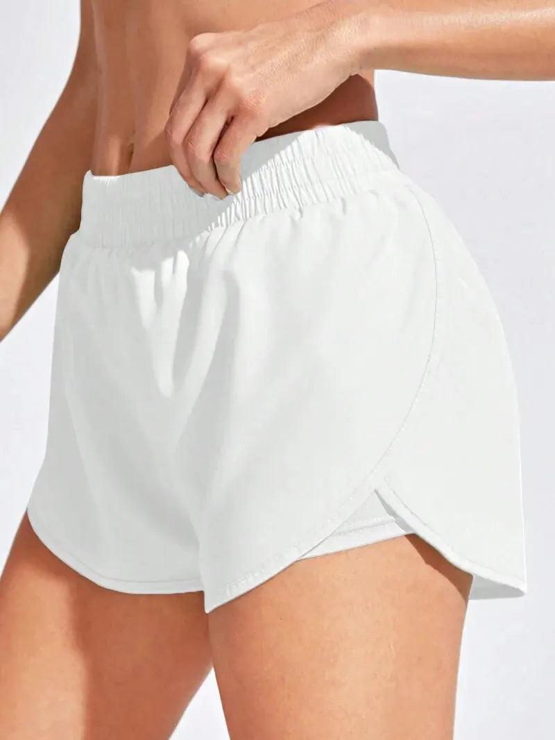 Women’s elastic high stretch yoga shorts by Athletic Sanctuary, designed for fitness and running, shown in a comfortable fit.