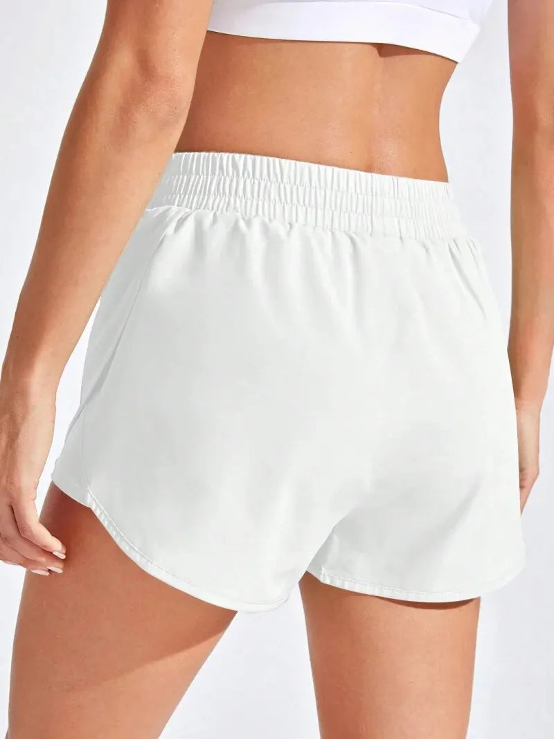 Women’s athletic yoga shorts by Athletic Sanctuary featuring high stretch elastic waistband for fitness and running activities.