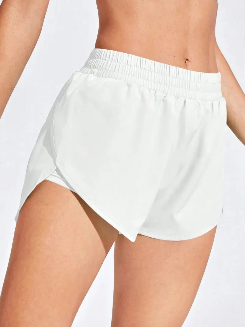 Women’s Athletic Sanctuary yoga shorts with high stretch elastic waistband, ideal for fitness, running, and active wear.