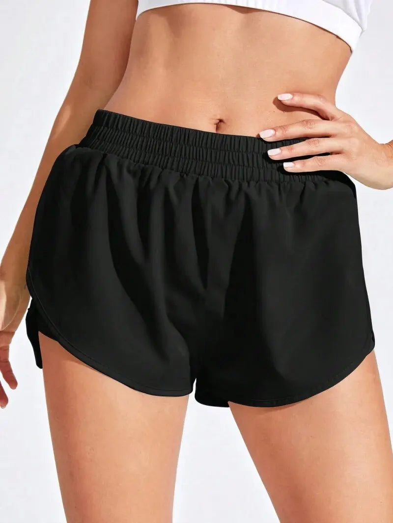 Women’s high stretch yoga shorts by Athletic Sanctuary, featuring elastic waist for fitness and running activities.