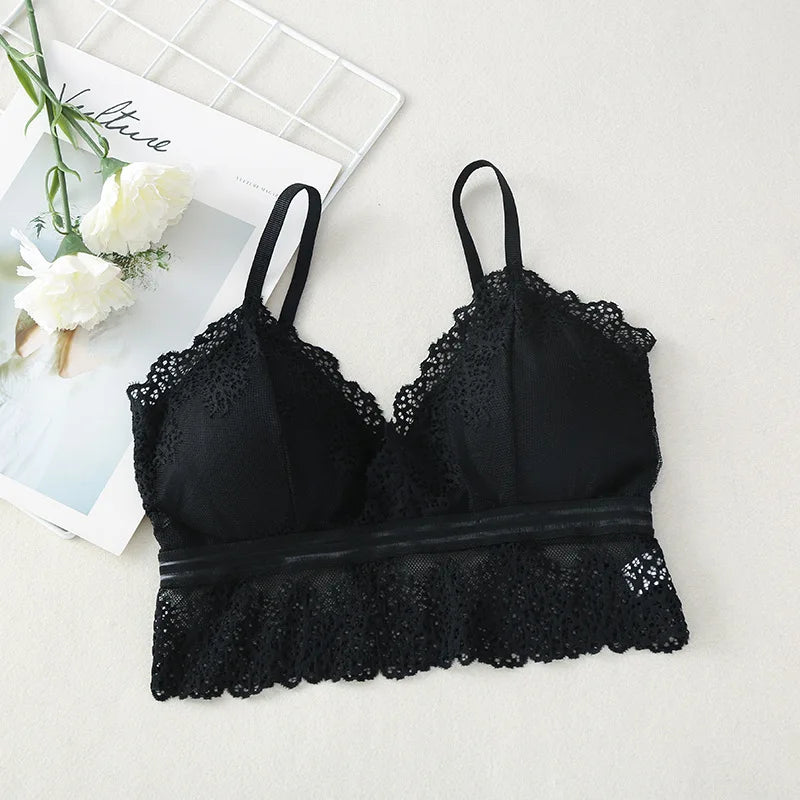 Seamless women's lace tube top bralette with V-neck, crop style, from Athletic Sanctuary, shown in black on a white background.